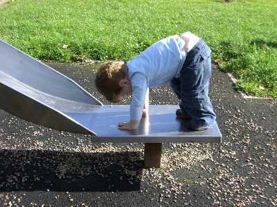 Isaac on a slide